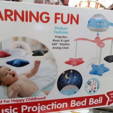 Музыкальная карусель на кроватку для малышей с проектором 35614